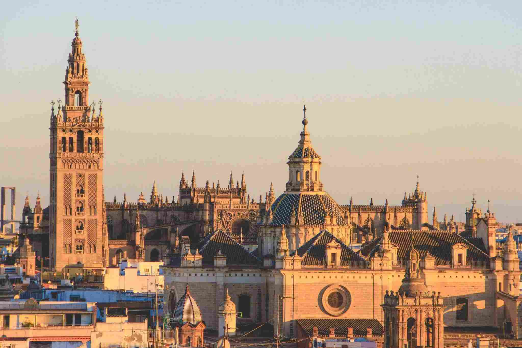 View of Seville Cathedral with its Gothic details and the Giralda tower