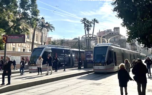 Seville tram passing the Archivo de Indias