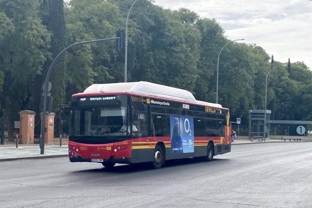 Seville bus passing the Prado de San Sebastián transport hub, main interchange in the city
