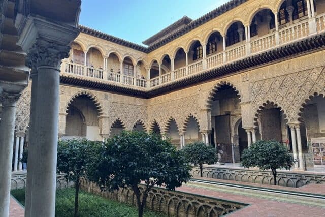 Patio de las Doncellas courtyard inside the Royal Alcázar of Seville, with Moorish arches