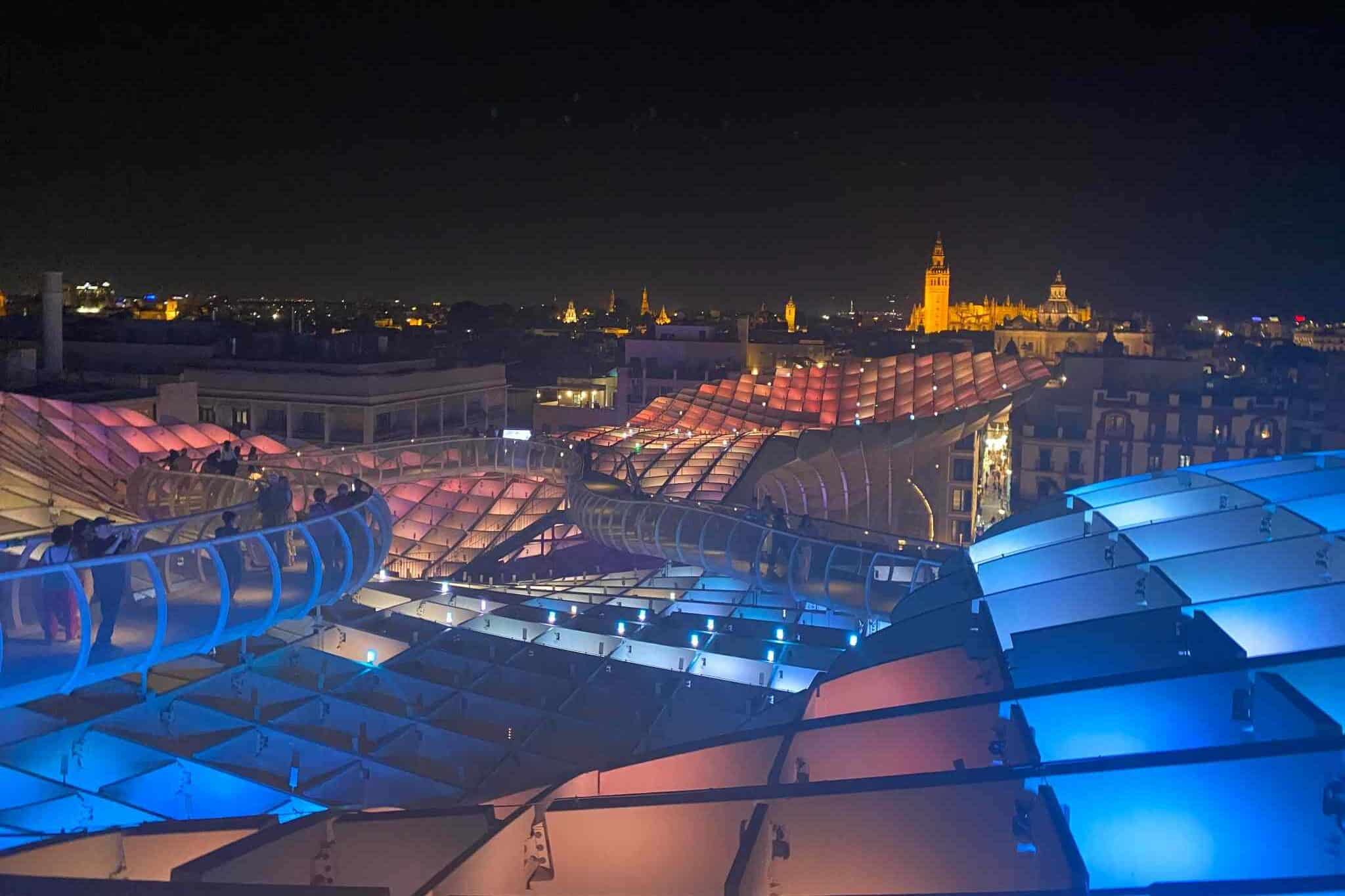 Evening view of Seville Cathedral from the illuminated Metropol Parasol