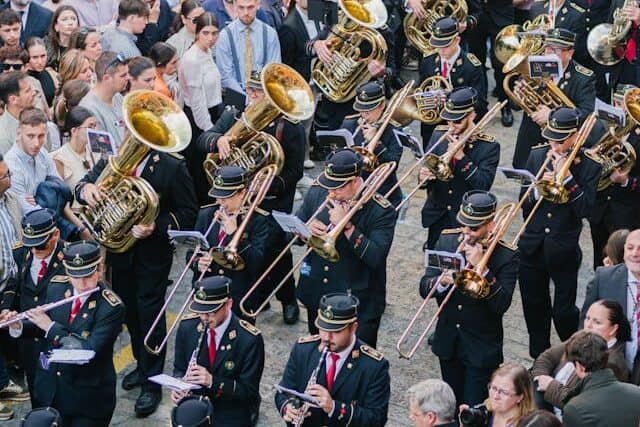 Musical band following a brotherhood during Semana Santa in Seville